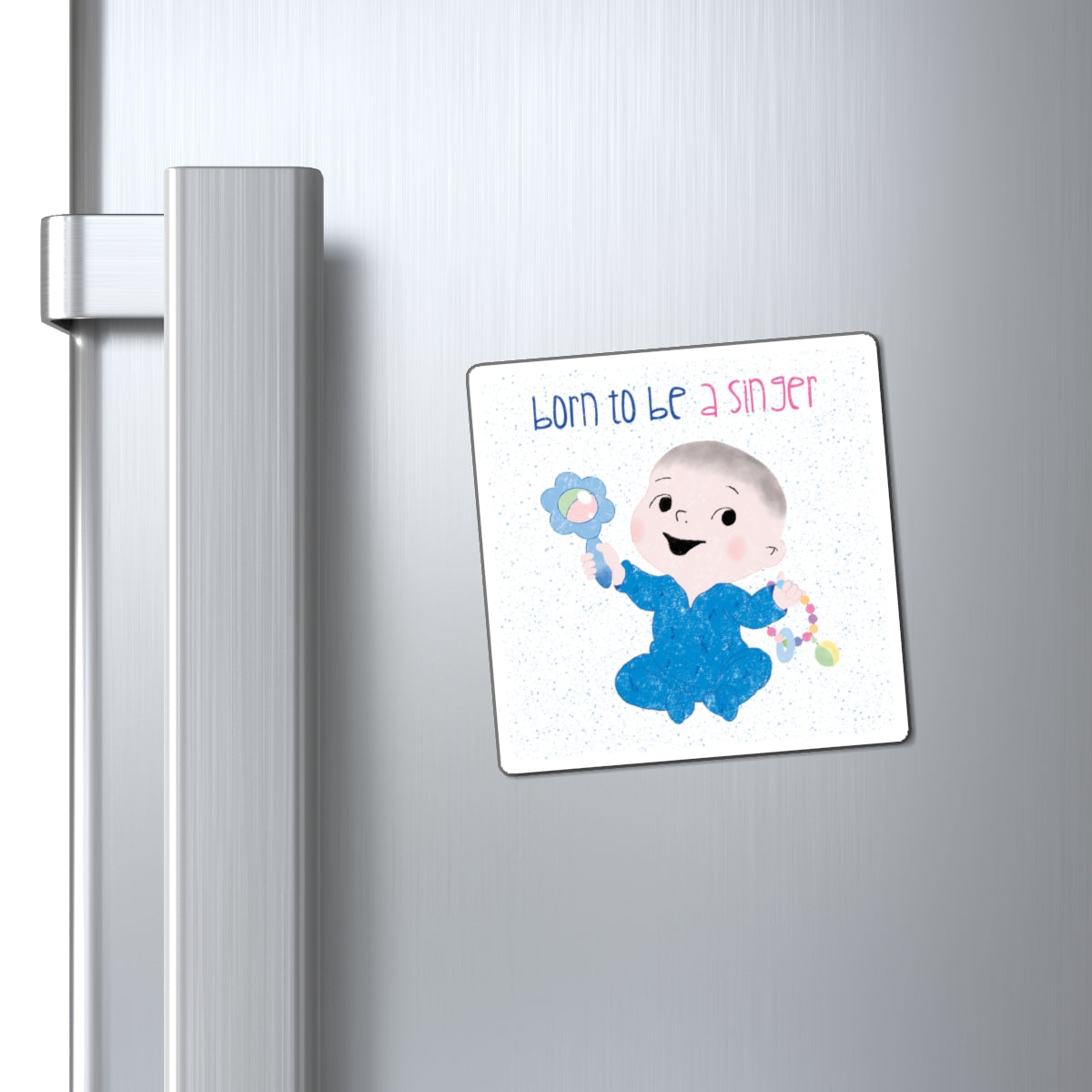 Hilarious nursery fridge magnet (3”x3” size) featuring a cartoon baby boy holding a rattle, with the text "Born to be a singer”, close-up, kidlic