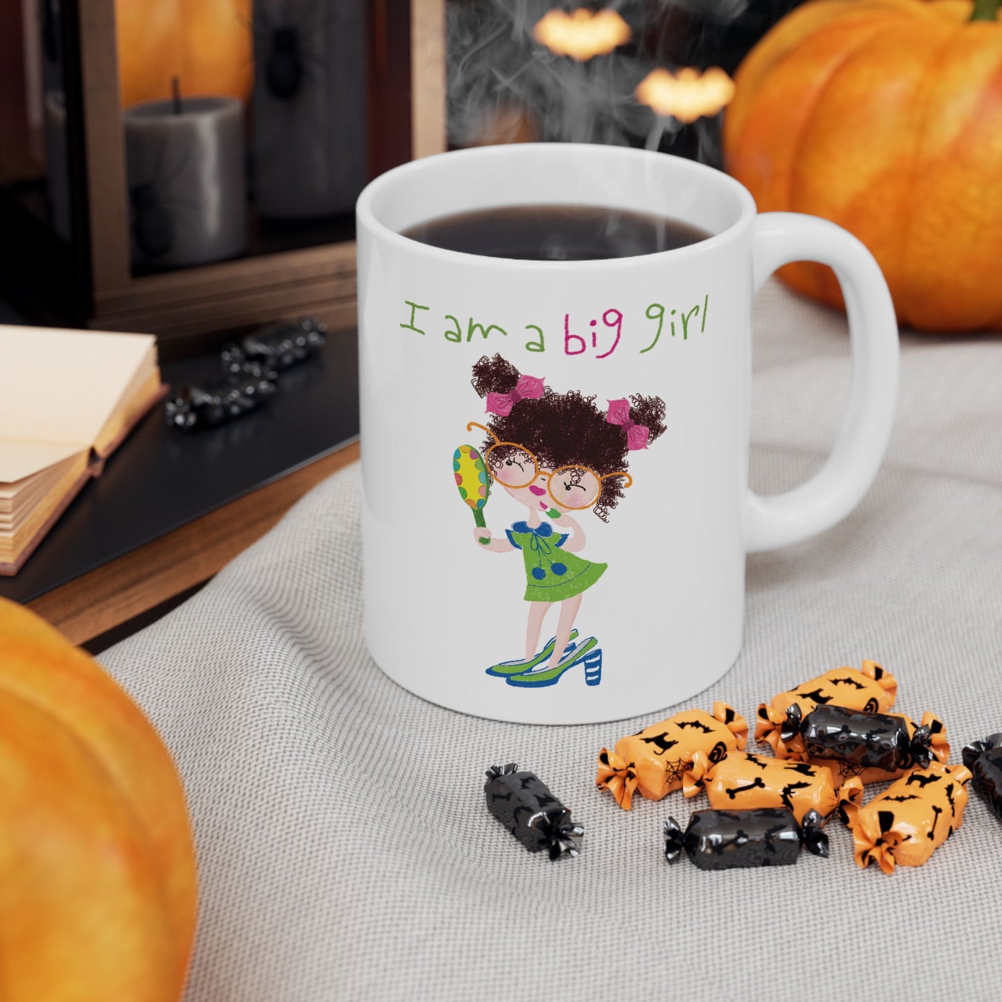 Charming hilarious coffee mug featuring a cartoon girl with curly hair, wearing oversized glasses, high heels, and a green dress, holding a mirror , with the text 'I am a big girl’ on the table in the living room, size: 11 oz, kidlic