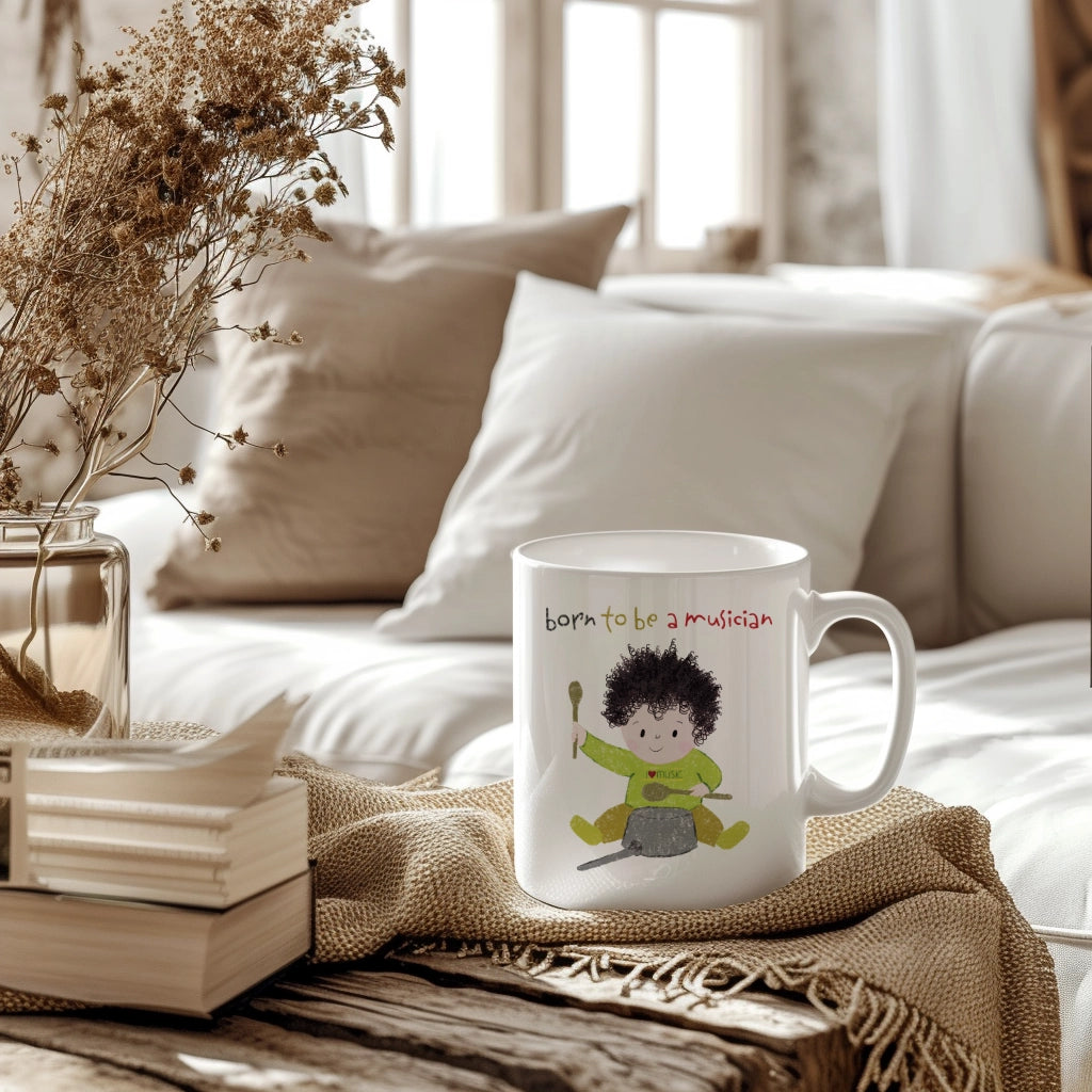 Humorous 11 oz nursery coffee mug featuring a cartoon baby boy playing a pot with a wooden spoon, with the text 'Born to be a musician’, on coffee table in the living room, size 11oz, free shipping, USA, kidlic