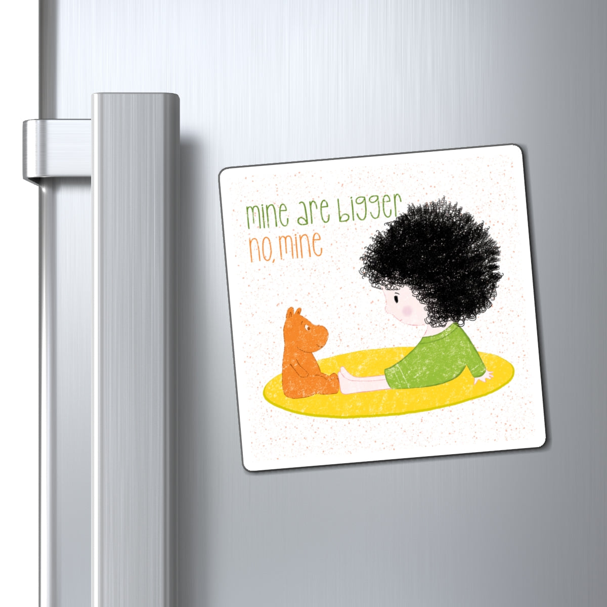 Playful fridge magnet featuring a cartoon baby girl sitting on a yellow mat, facing a brown stuffed animal, with the text 'mine are bigger, no, mine’, size 4”x4”, close-up, kidlic