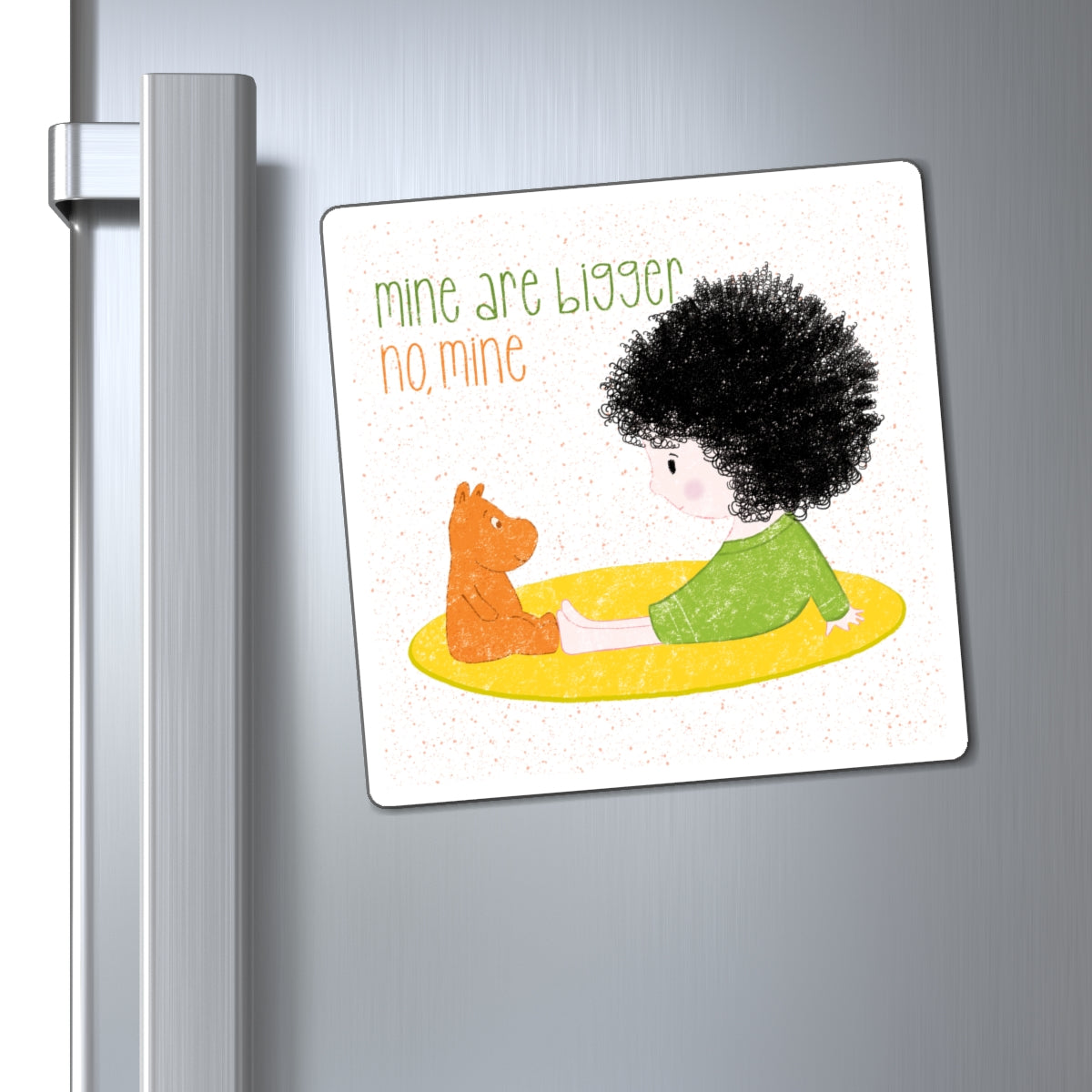 Sweet fridge magnet featuring a cartoon baby girl sitting on a yellow mat, facing a brown stuffed animal, with the text 'mine are bigger, no, mine’, size 6”x6”, close-up, kidlic