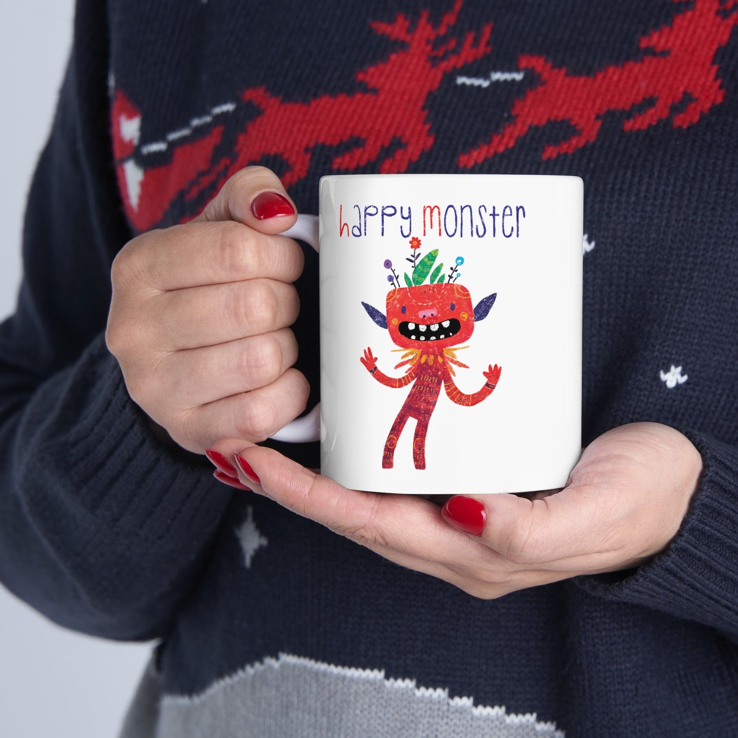 Playful coffee mug featuring a red happy monster bursting with excitement, and the text 'Happy Monster’, 11 oz, close-up, kidlic