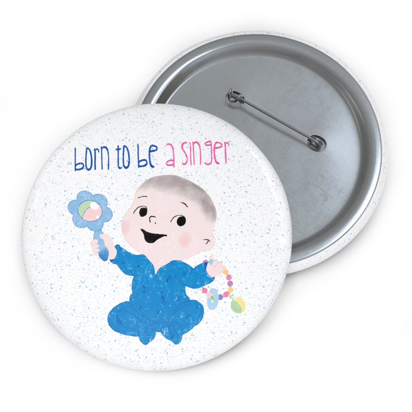 Playful baby nursery singer-themed pin button featuring a cartoon baby boy holding a rattle, with the text "Born to be a singer”, 2.25” size, kidlic