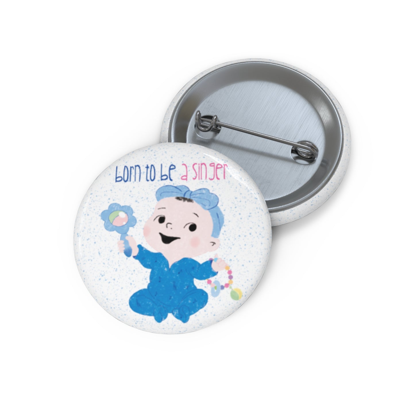 Playful nursery pin button featuring a cartoon baby girl holding a rattle, with a text “Born to be a Singer”, size 1”, free shipping, kidlic