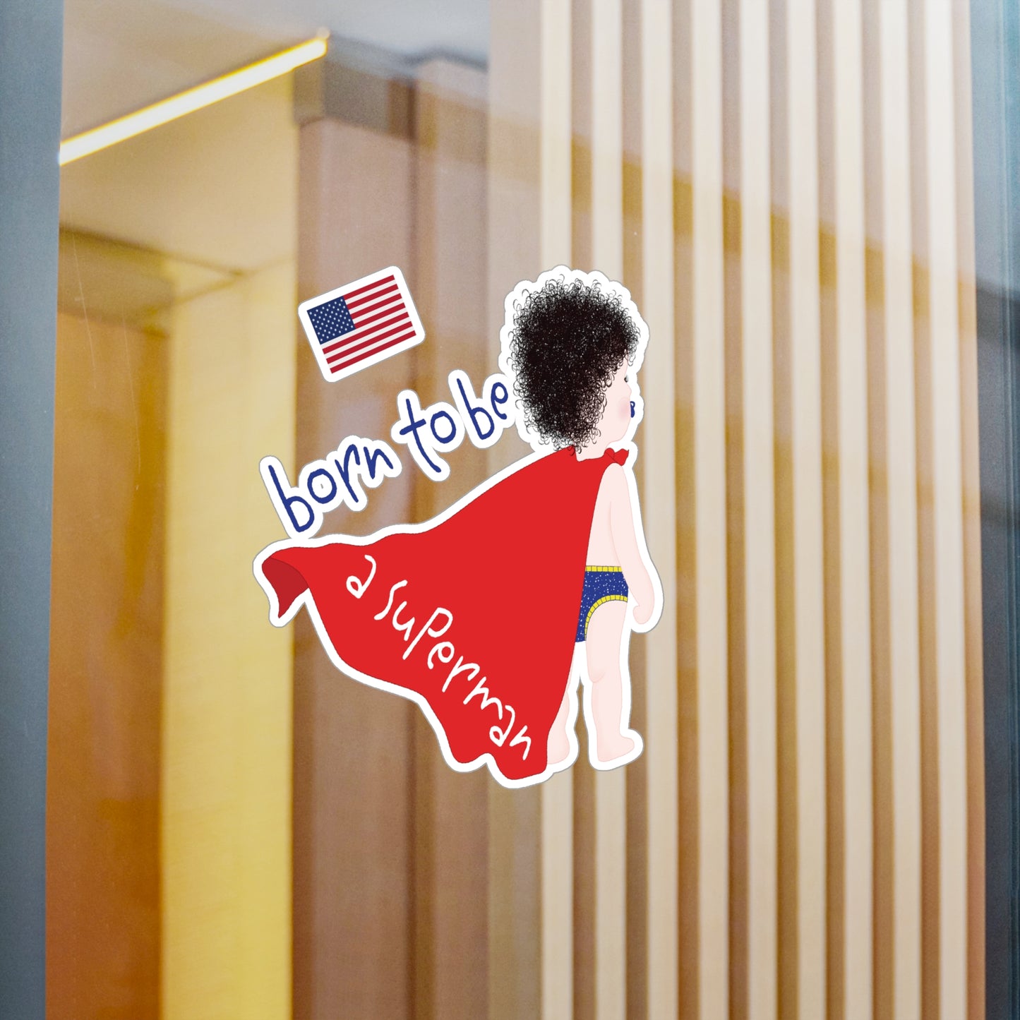 Dark-Haired Superman baby wall decal on a glass wall 