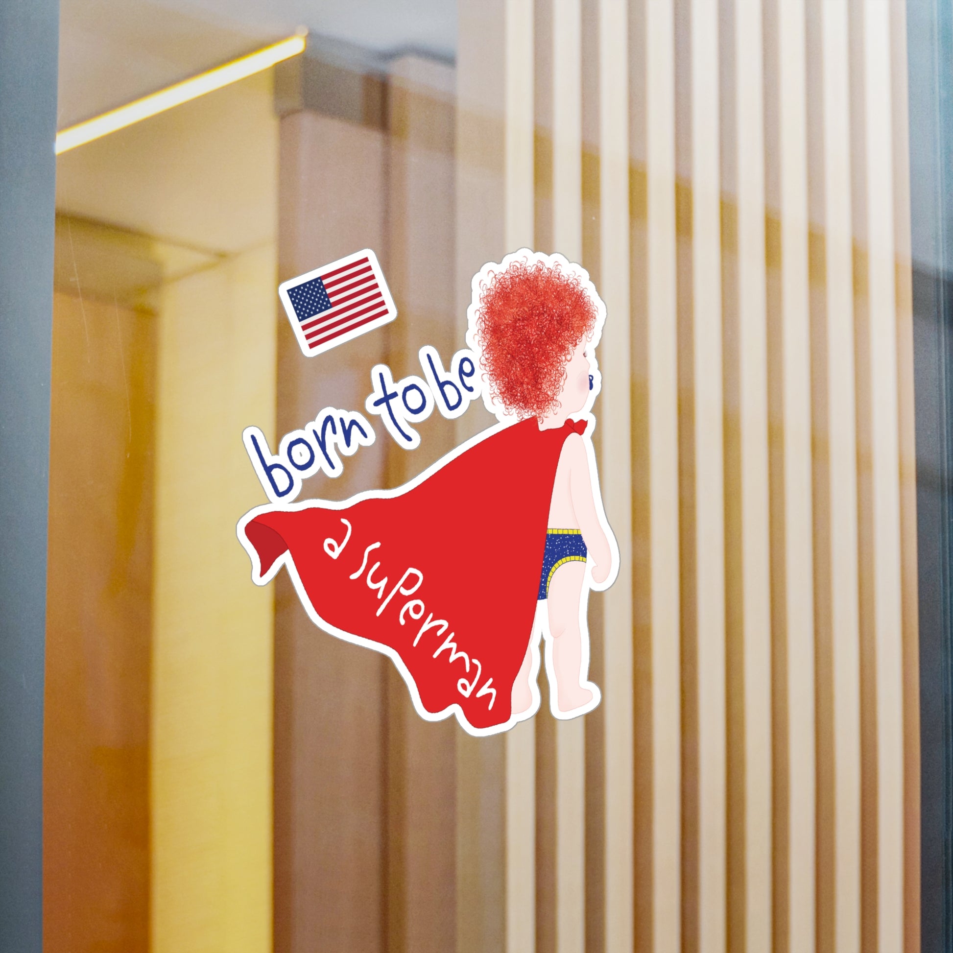 Redhead Superman baby wall decal on glass wall close-up